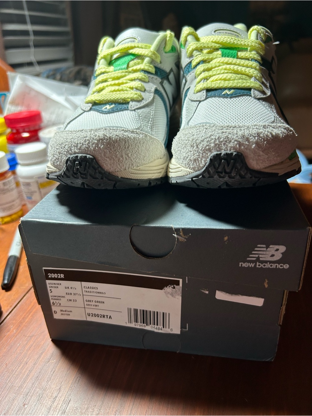 Women’s New Balance 2002R Sneakers in Gray, Green and Yellow